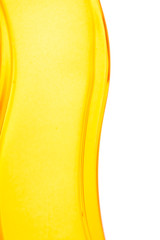 Abstract art wave lines graphic picture of yellow glass bottle