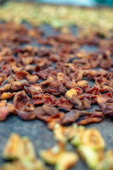 Homemade dried apricots. A sheet with halves of apricots.