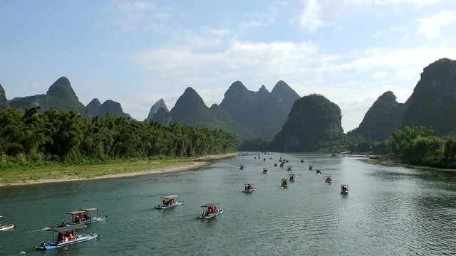 Lot of rafting boats of the Li River cruise. Yangshuo, Guilin, Guangxi Zhuang, China 