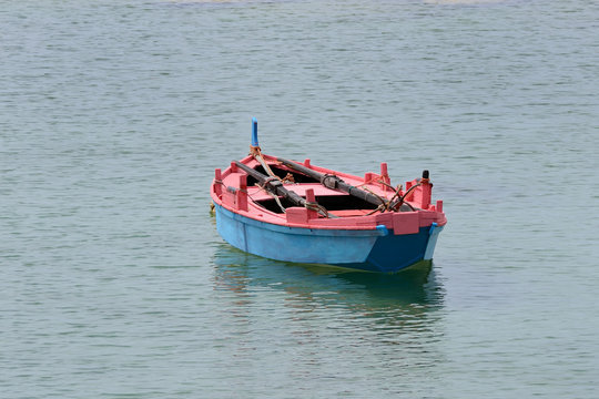 Fototapeta wooden fishing boats moored