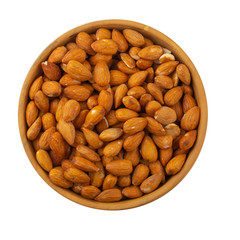 Almonds in wooden bowl isolated on a white background