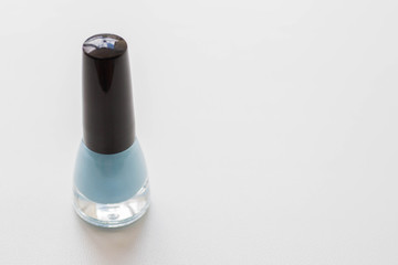 blue nail polish on white background