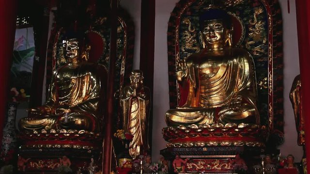 Golden Buddha statues in temple