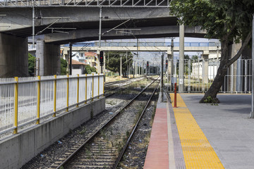 Perspective shot of train station at suburban area