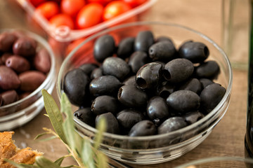 black olives in the bowl served for snack.