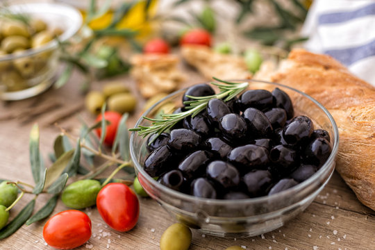 black olives in the bowl served for snack.
