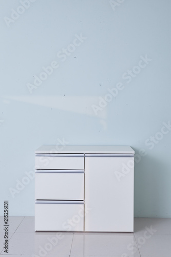White Storage Stand With Ceramic And Dishware In Kitchen Modern
