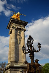 Fototapeta na wymiar Details of the iconic Pont Alexandre III over the Seine in Paris