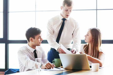 Fototapeta premium Group of young business people working in office.