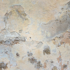 Old Wall With Peel Grey Stucco Texture. Retro Vintage Worn Wall Background. Decayed Cracked Rough Abstract Wall Surface.