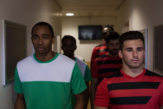 Football players leaving the dressing room