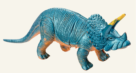triceratops dinosaur toy isolated on white background