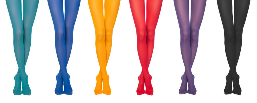 Women's Legs In Colorful Tights Isolated.