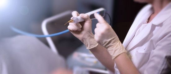 cosmetic procedure, removal of a birthmark or papilloma with a laser.