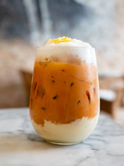thai tea milkshank sweet drink on the glass for refreshment