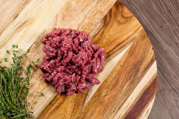 Raw lamb mince on chopping board