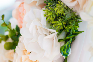 Wedding banquet tables preparing for a wedding outside on a summer day