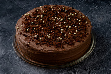Sweet dark brown chocolate cake with decoration