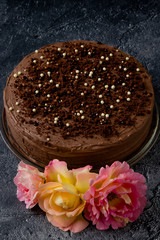 Sweet dark brown chocolate cake with decoration