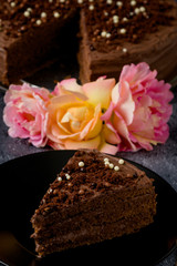 Sweet dark brown chocolate cake with decoration