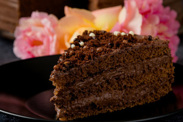 Sweet dark brown chocolate cake with decoration