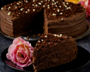 Sweet dark brown chocolate cake with decoration