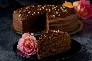 Sweet dark brown chocolate cake with decoration
