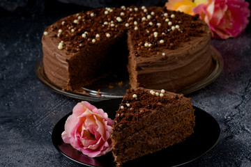 Sweet dark brown chocolate cake with decoration