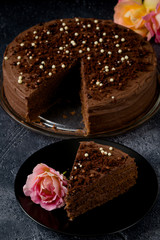 Sweet dark brown chocolate cake with decoration