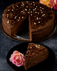 Sweet dark brown chocolate cake with decoration