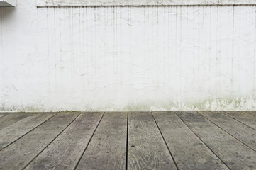 Empty top wood table over grunge brick wall background. For Product display montage.
