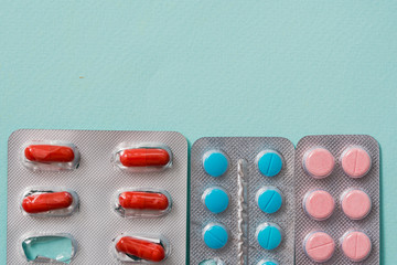 Full frame variation of medicine in blister packaging in pharmaceutical, medication concept background with multiple dosage form for cure or treatment human disease