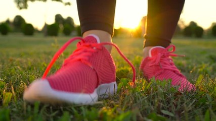 Running shoes - woman tying shoe laces