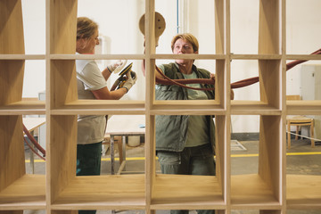 Female Workers In The Uniform Working At The Furniture Factory