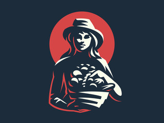 Woman farmer with basket of vegetables and fruits.