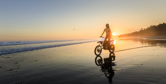 Young woman on BMX bike