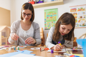 Preschool Teacher with Children at Kindergarten - Creative Art Class