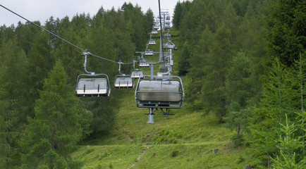 cable cars going up in austrian alpen