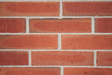 Closeup of red brick wall texture.
