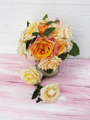 beautiful flowers on a wooden background