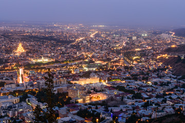 Beautiful aerial view of Tbilisi city with illumination, Tbilisi, Georgia