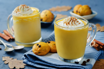 Pumpkin spice latte with whipped cream and pumpkin chocolate chips cookies
