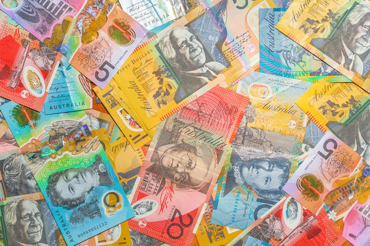 Australian banknotes background of dollars of Australia, AUD currency. Financial colorful background.