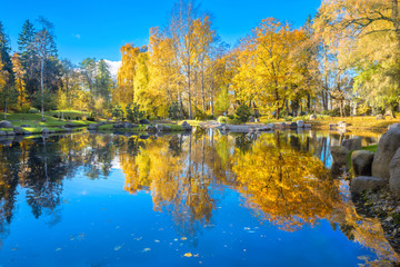 Japanese garden of stones in park Kadriorg with beautiful pond at golden autumn. Tallinn, Estonia
