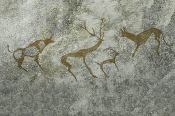 An image of animals on a cave wall by an ancient man. archeology, ancient history.