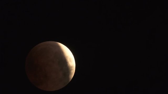 Lunar Eclipse on 28 of July 2018 - the moon appears darkened as it passes into the earth's shadow. It was observed in the European part of Russia. Timelapse video.