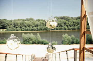 wedding arch on the river bank