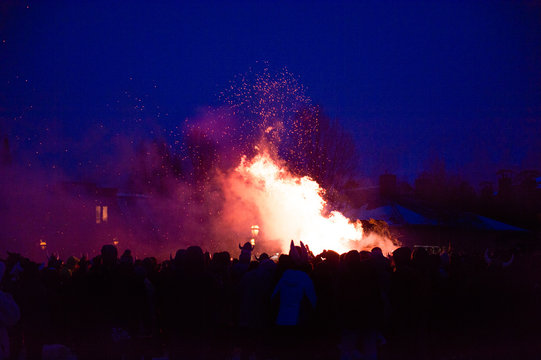 Revellers at a bonfire