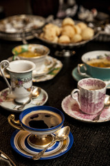 elegant cooffe cup on a dark wooden table.