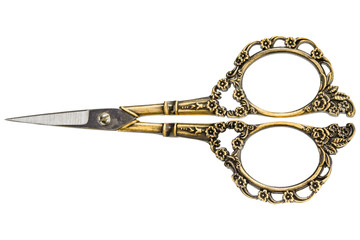 Scissors with curly handles from gold, isolated on white background